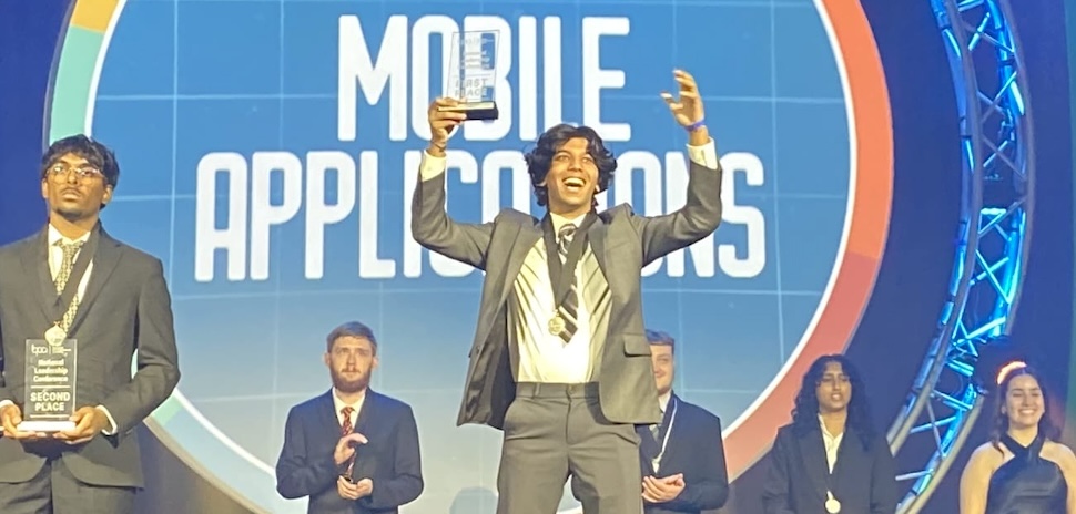 Student with an award image